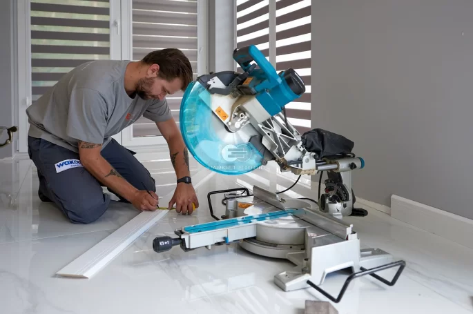 Installation of skirting boards.